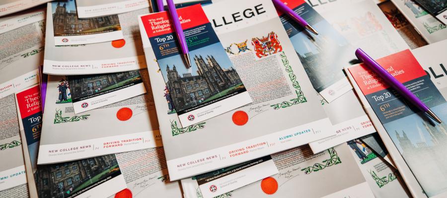 Colour photo of copies of the 2023 New College Magazine and Undergraduate School Leaflets lying on a table